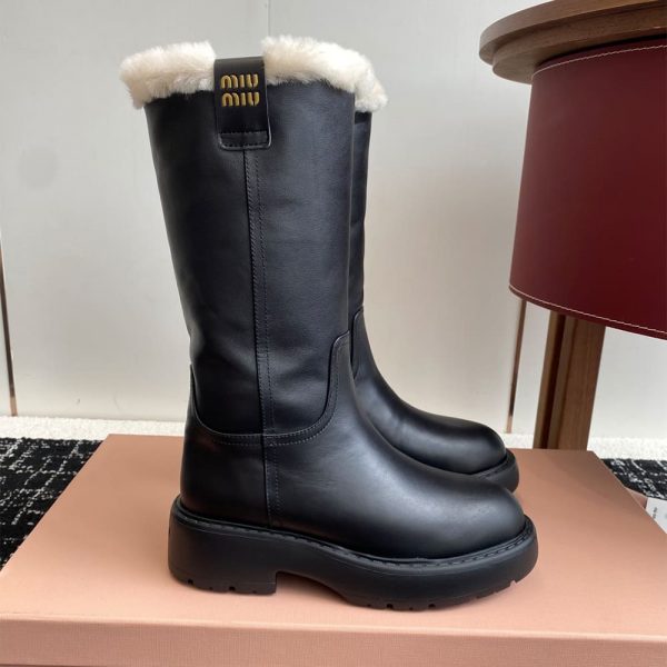 MiuMiu fumé leather boots