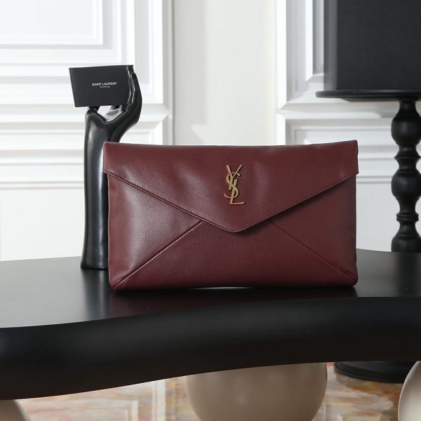 YSL CASSANDRE large envelope pouch in shiny leather