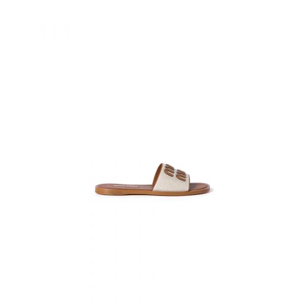 MiuMiu Canvas and leather slides