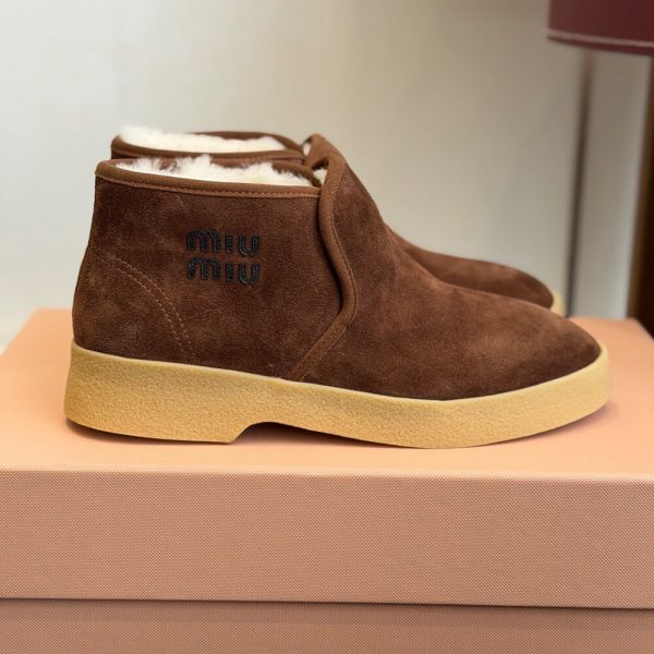 MIUMIU Suede and shearling slip-on booties