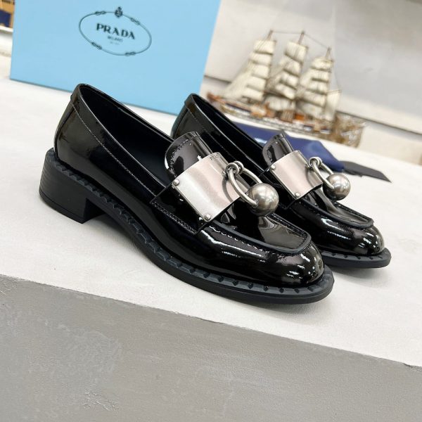 PRADA Brushed leather loafers with metal details