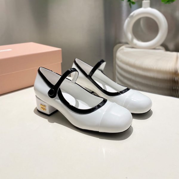 MiuMiu Two-tone patent leather Mary Jane pumps