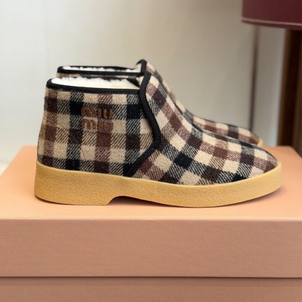 MIUMIU Wool and shearling slip-on booties