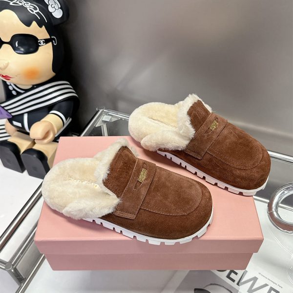 MIUMIU Suede mules