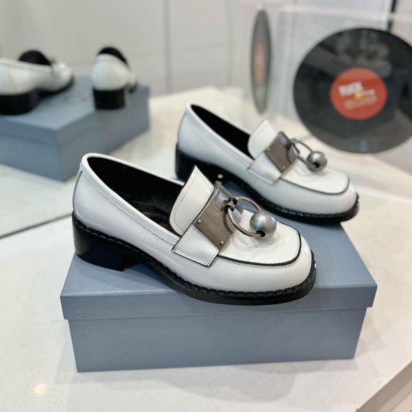 PRADA Brushed leather loafers with metal details